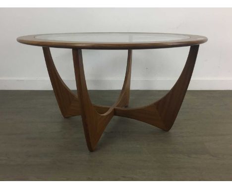 VICTOR WILKINS (BRITISH, 1878-1972) FOR G-PLAN, 'ASTRO' TEAK COFFEE TABLE 1960-69 glass topped and raised on four angled supp