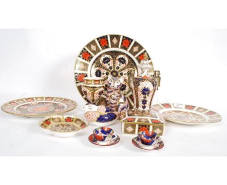 A collection of Royal Crown Derby Imari pattern china to include vases, plates, cat, dishes, trinket box, duck etc