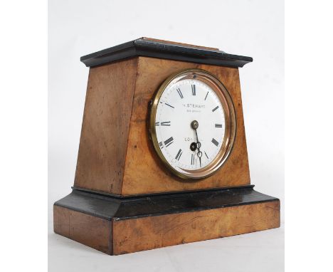 A Victorian walnut cased mantel clock by W Steward 200 Strand, London. The enamel face having bevelled glass door, brass move