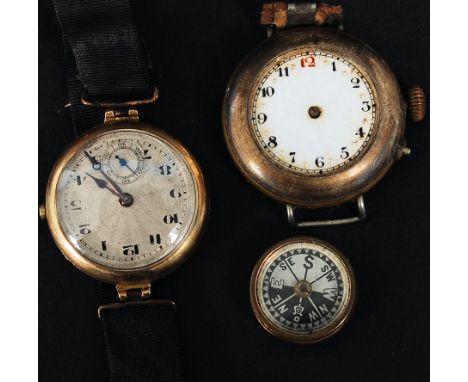 A ladies 9ct gold watch having silvered dial with subsiduary seconds hand on ribbon strap. Together with a 9ct gold compass a