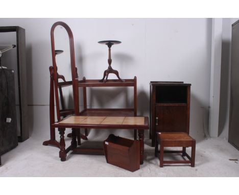 A collection of assorted furniture to include tile top coffee table, cheval mirror, bedside cabinet, tables etc