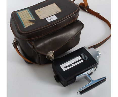 A  vintage Bell & Howell Optonic hand held video camera complete with leather case and strap