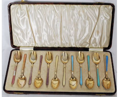 Suckling Ltd, Birmingham, 1957. Set of 12 hallmarked silver and enamel painted spoons. Enamel decorated to handle both sides,