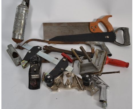 A collection of vintage woodworking tools to include floorboard remover, Stanley planes and other items