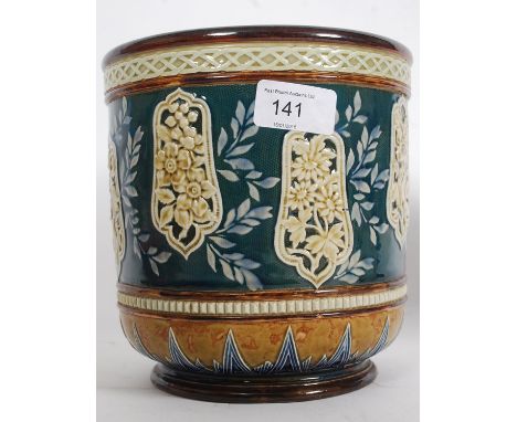 A 19th century Doulton Lambeth Slaters Majolica planter being stamped to base with further initials EW. Additional incised ma