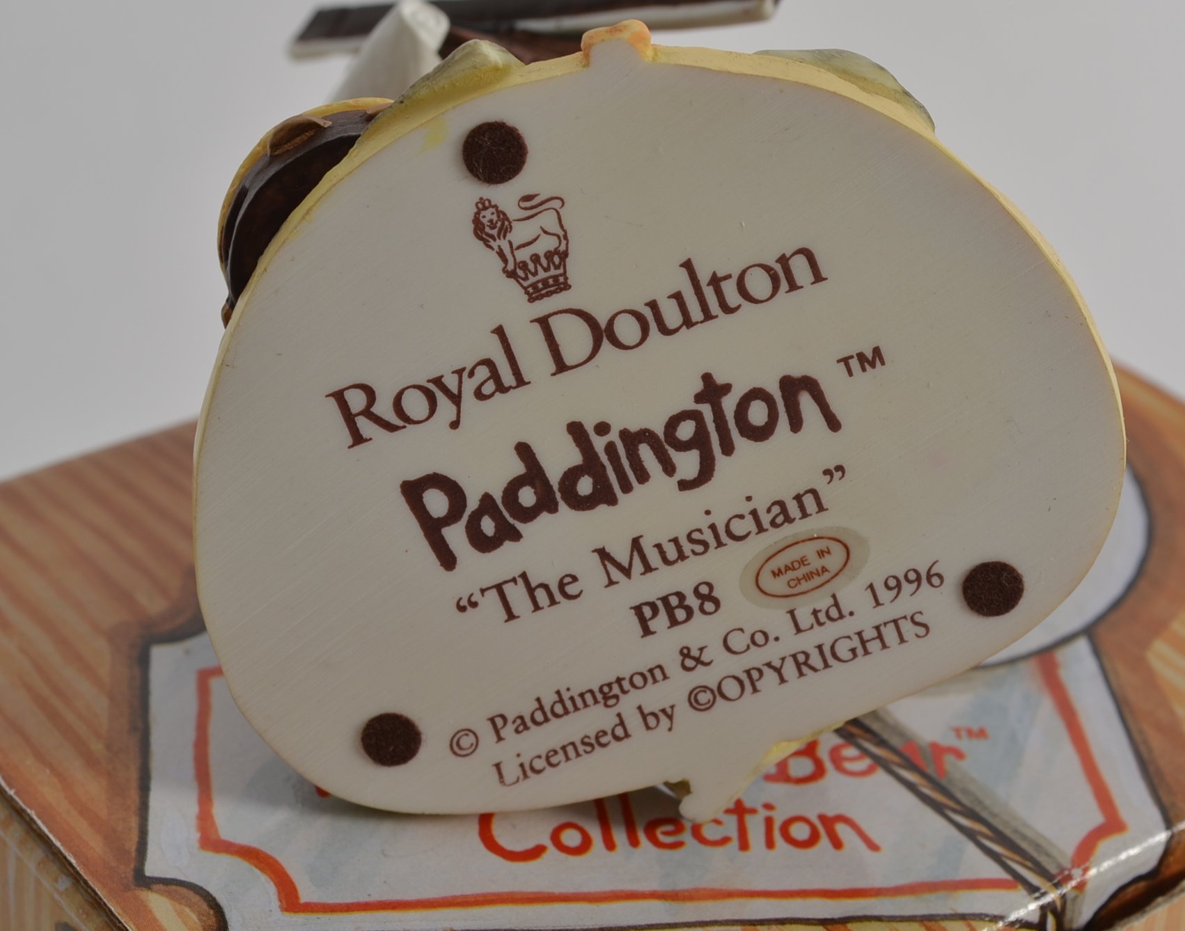 A Royal Doulton Paddington Bear figurine, in original box.