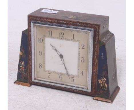 A 1930's chinoserie painted 8 day mantel clock. The walnut hand painted case having 8 day movement and silvered dial