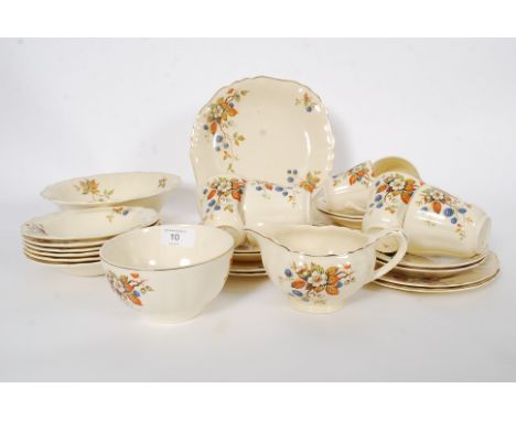 A J G Meakin "Sunshine" tea set along with a set of fruit bowls