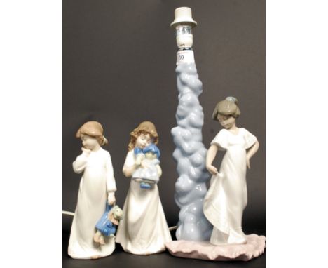 A collection of Lladro Nao figurines to include table lamp and 2 children figurines ( 3 total )