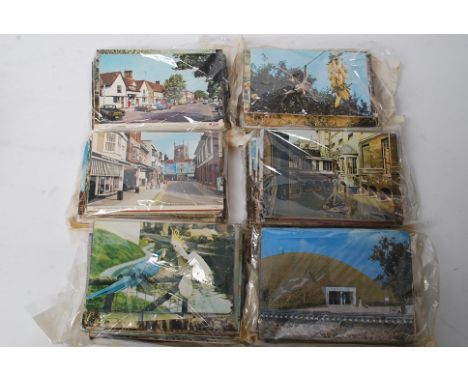 A good collection of retired dealer stock of postcards to include 20th century colour subjects, such as seascape, beach resor