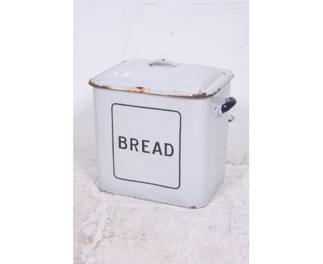 A 20th century enamel bread bin in blue and white with lid (and assorted vintage contents)