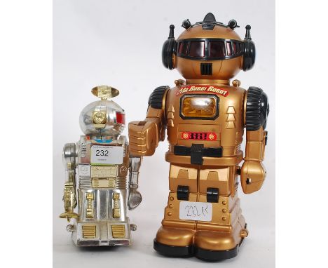 Mr Robbi Robot vintage robot toy together with another Japanese robot, both taking batteries
