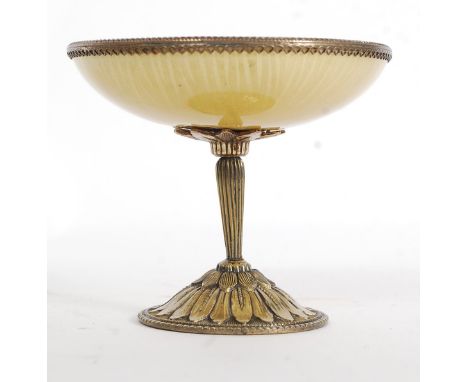 A 19th century French ormolu and enamel set tazza. Raised on a reeded tapered stem with enamel set shallow bowl.. Measures 8.