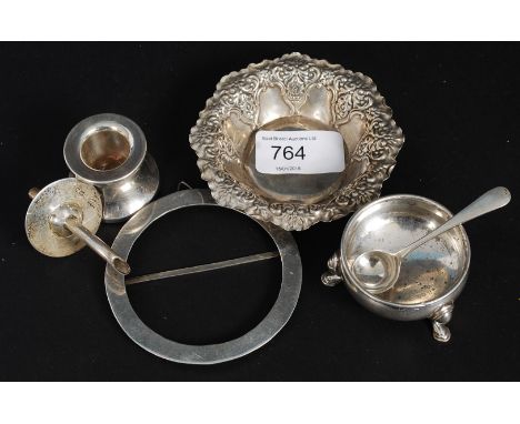 A collection of hallmarked silver items to include a miniature round frame, salt, candlestick holder, spoon and dish etc.