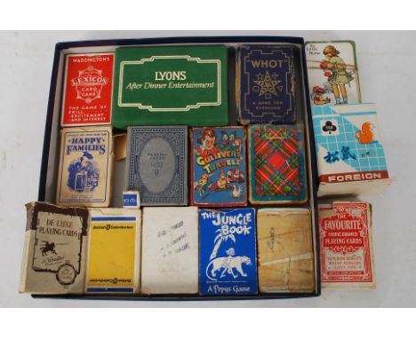 A good collection of playing card games to  include Happy Families, Gullivers Travels, Negro playing cards, Lexicon, Whot, Sq