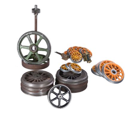 Collection  of live steam locomotive firing tools and sundry locomotives wheels.