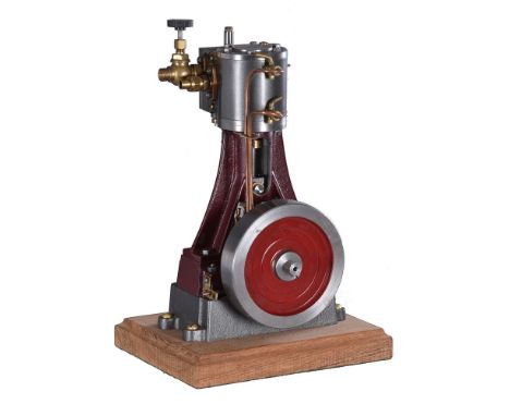 A Stuart Turner No 4 vertical live steam mill engine, with metal clad cylinder, trunk guide, eccentric driven steam valve fro