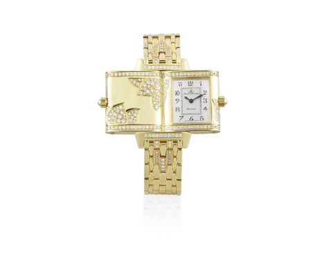 Jaeger-LeCoultre. A lady's 18K gold and diamond set quartz reversible rectangular bracelet watchModel: ReversoReference: 265.