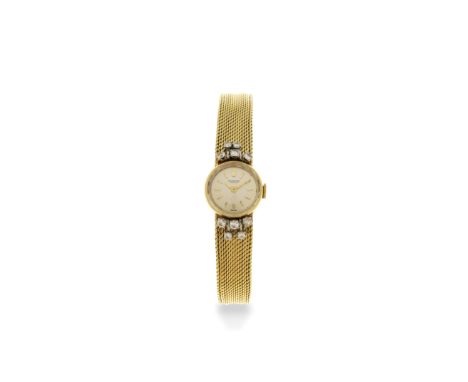 International Watch Company. A lady's 18K gold and diamond set manual wind bracelet watchDate: Circa 1957Movement: Jewelled C