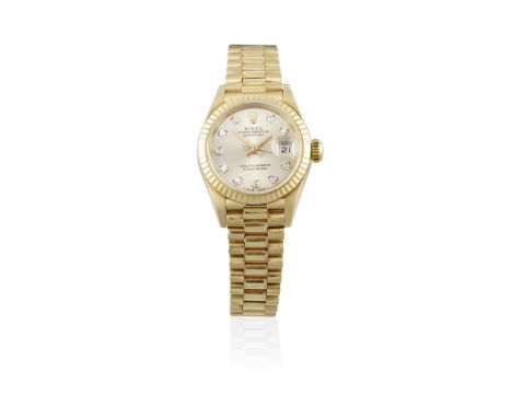 Rolex. A lady's 18K gold automatic calendar bracelet watch with diamond set dialModel: DatejustReference: 69178/69000ADate: C