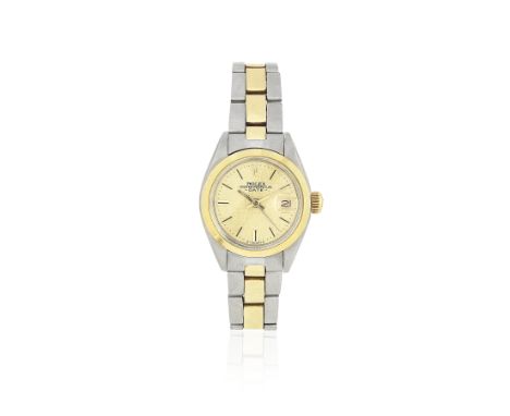 Rolex. A lady's stainless steel and gold automatic calendar bracelet watch with sigma dialModel: DateReference: 6917Date: Cir