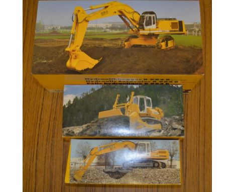 Three boxed 1/50 scale diecast Liebherr models by Conrad, all in good working condition: An R 984B Litronic hydraulic excavat