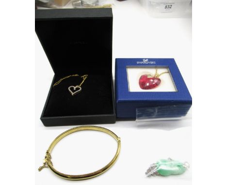 Hallmarked Sterling silver 1977 ingot on silver chain and three other hallmarked sterling silver pendants on silver chains, a