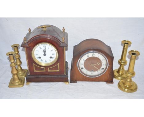 2 vintage mantle clocks, 5 brass candlesticks, a vintage iron, clock winding keys, napkin holders, a small hip flask etc. 