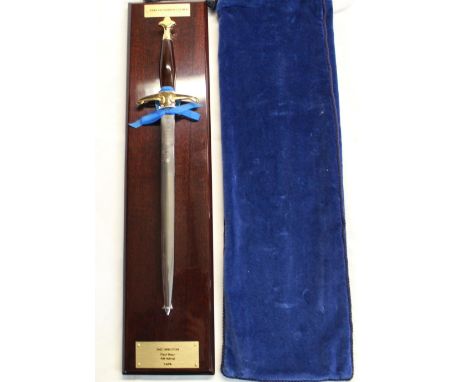 Wilkinson Sword of London medieval style dagger with brass crossguard, rosewood handle and brass pommel in shape of star, on 