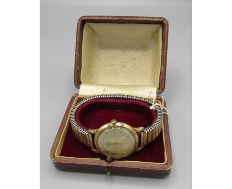 Late 1950s Rotary 9ct gold hand wound wristwatch. Signed two tone silvered dial with applied Arabic and baton hours, two piec