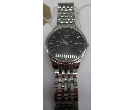 Gents Tissot stainless steel cased quartz wrist watch, circular black dial with arrow markers and date, on bracelet strap 