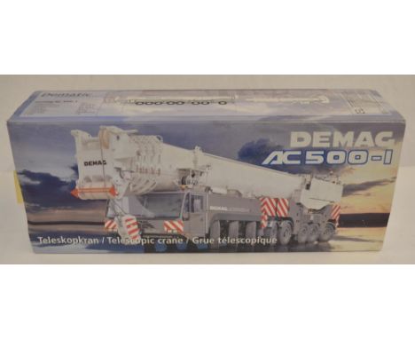 Boxed 1/50 scale diecast Demag AC 500-1, yellow Schmidbauer KG livery mobile crane model by Conrad (model no 2095/0). Model i