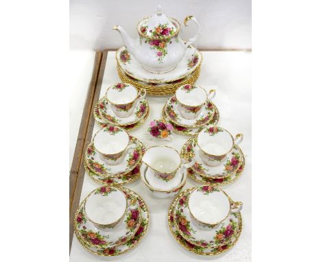 A ROYAL ALBERT OLD COUNTRY ROSES PATTERN TEA SERVICE, SET OF SIX DINNER PLATES AND BARROW OF FLOWERS ORNAMENT, PRINTED MARK 