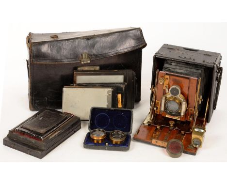 A SANDERSON BLACK COVERED MAHOGANY AND BRASS JUNIOR QUARTER PLATE CAMERA, ALDIS DUO LENS AND A CASED PAIR OF WITH ALDIS SUPPL