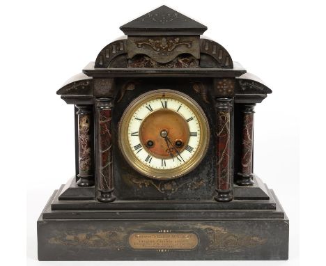 A FRENCH SLATE AND CORNISH SERPENTINE ARCHITECTURAL CASED MANTEL CLOCK, 33CM H, WITH ENGRAVED BRASS TABLET DATED 1902 