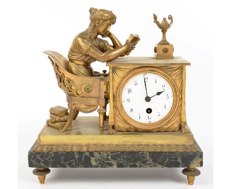 A FRENCH EMPIRE ORMOLU CLOCK, WITH A WOMAN EMBLEMATIC OF LITERATURE IN A BERGERE AT A TABLE WITH LAMP AND BOOK, ASSOCIATED EN