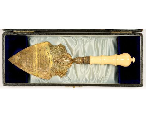 A VICTORIAN SILVER GILT TROWEL, 28 CM L, INSCRIBED THE WORSHIPFUL COMPANY OF HABERDASHERS PRESENTED TO THE RT HON THE LORD MA