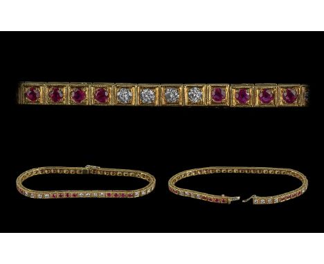 Ladies 18ct Yellow Gold Superb Quality Ruby and Diamond Set Line Bracelet, marked 18ct, the rubies of superb pigeon blood red