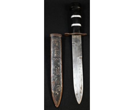 An Italian Fascist M.V.S.N. Blackshirt paramilitary dagger, 20.6cm double-edged steel blade, the shaped guard numbered 3 or 8