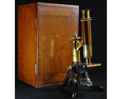 A late 19th/early 20th century patinated and lacquered brass monocular microscope, by Henry Crouch, London, no.8782, 29.5cm h