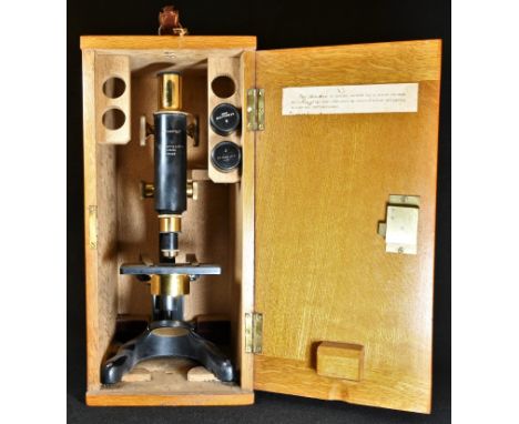 An early 20th century black and lacquered brass monocular microscope, "Stanstile", by W F Stanley &amp; Co Ltd, London, no.59