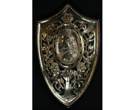 Royalty - a Victorian gilt brass Royal commemorative shield shaped plaque, Queen Victoria's Golden Jubilee, 1837 - 1887, embo