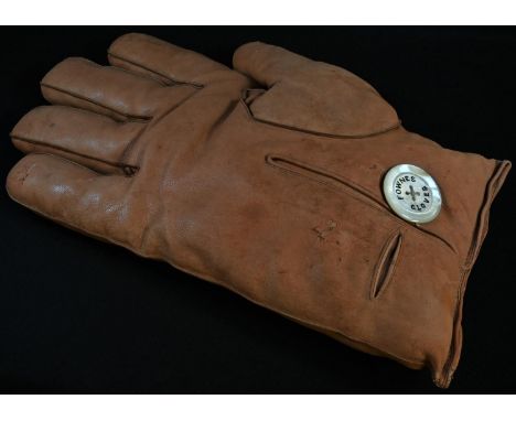 Advertising - an early 20th century promotional shop window display, as an oversize leather glove, the faux mother of pearl b