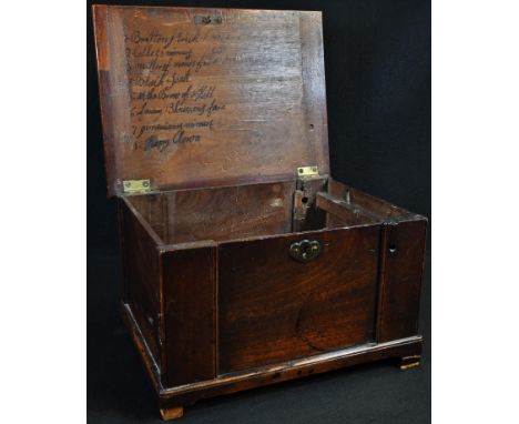 An unusual George III mahogany box, hinged cover, the front and side with removable sliding panels, the inside with a list of