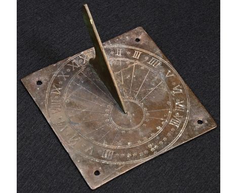 A 19th century brass sundial, Roman numerals, shaped gnomon, 9cm wide 