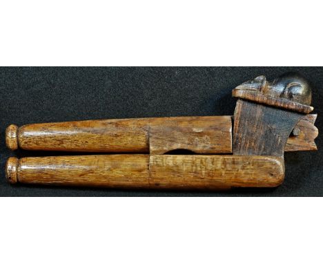 Robert Thompson, Mouseman of Kilburn - a pair of oak lever-action nut crackers, carved mouse signature, 21cm longReference: F