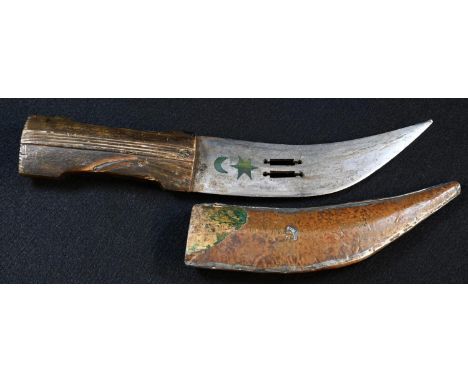 An Islamic dagger, 15.5cm long curved blade pierced with two lugs and picked-out in green pigment with a crescent moon and st