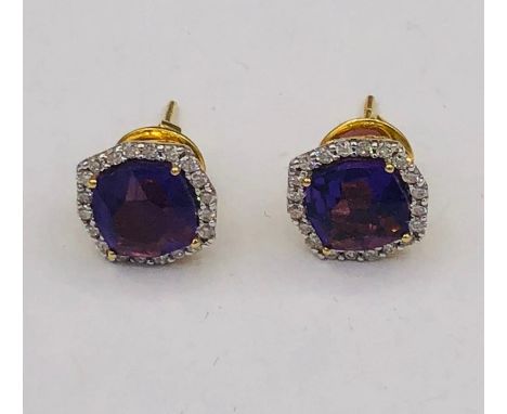 A Pair of 18ct yellow gold impressive Amethyst and Diamond Earrings of 4.2CT's 