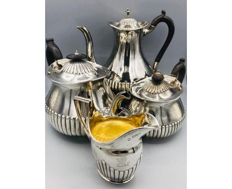 Four piece silver tea service Hallmarked London 1883 by JBH with the milk jug London 1894 by (WCJL) (2010g)