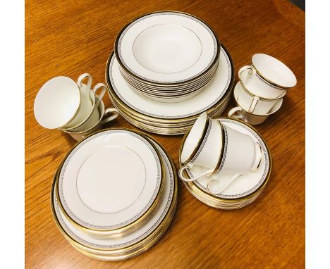 A Royal Doulton 'Pavanne' china dinner service to include Eight plates, eight sode plates, eight tea plates, eight bowls, and